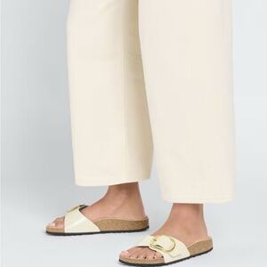 Birkenstock Cream Sandals with Black Buckle